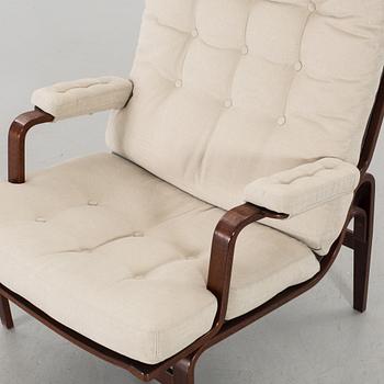 AN ARM CHAIR, By Bruno Mathsson Dux, late 20th century,