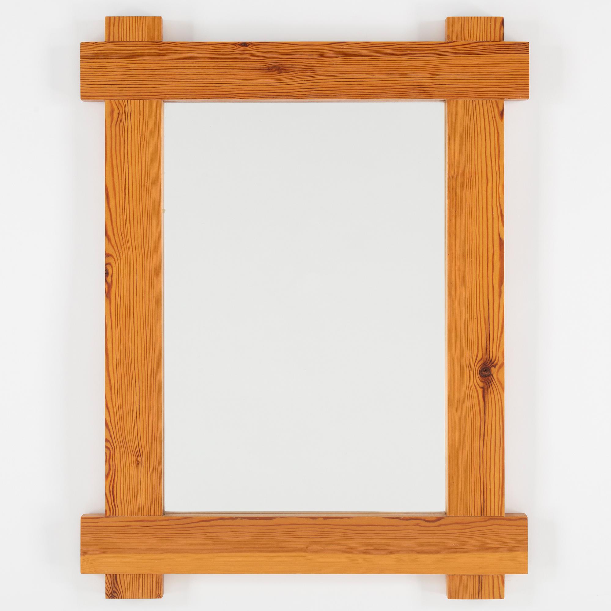 A 1980's pine mirror.