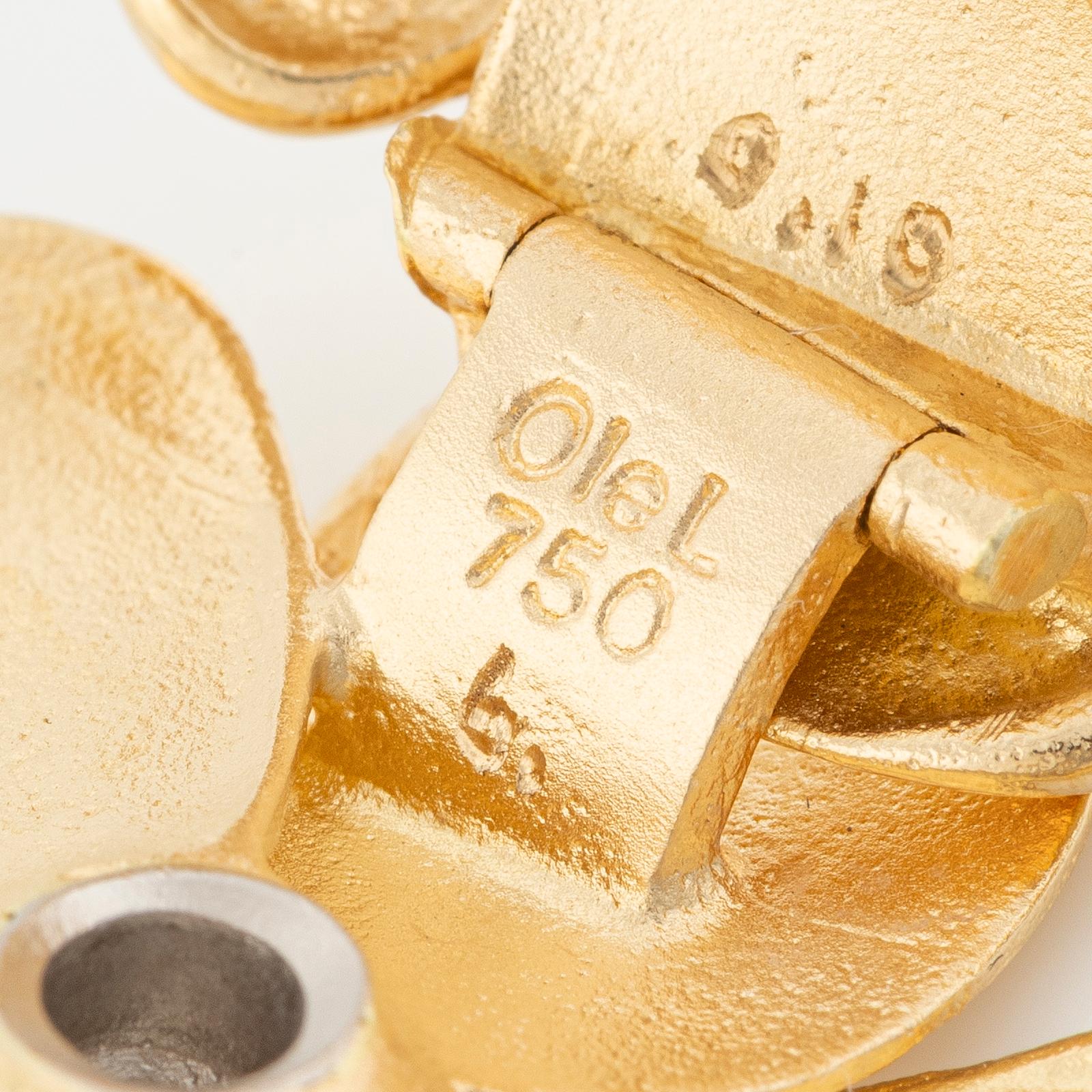 Ole Lynggaard, Charlotte Lynggaard, Lås, 18K guld med briljantslipade diamanter, i form av blomma.