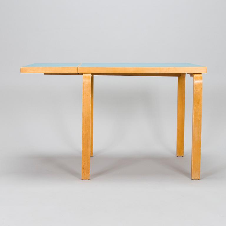 Alvar Aalto, A mid-20th century drop leaf table and chairs for O.Y. Huonekalu-ja Rakennustyötehdas A.B.