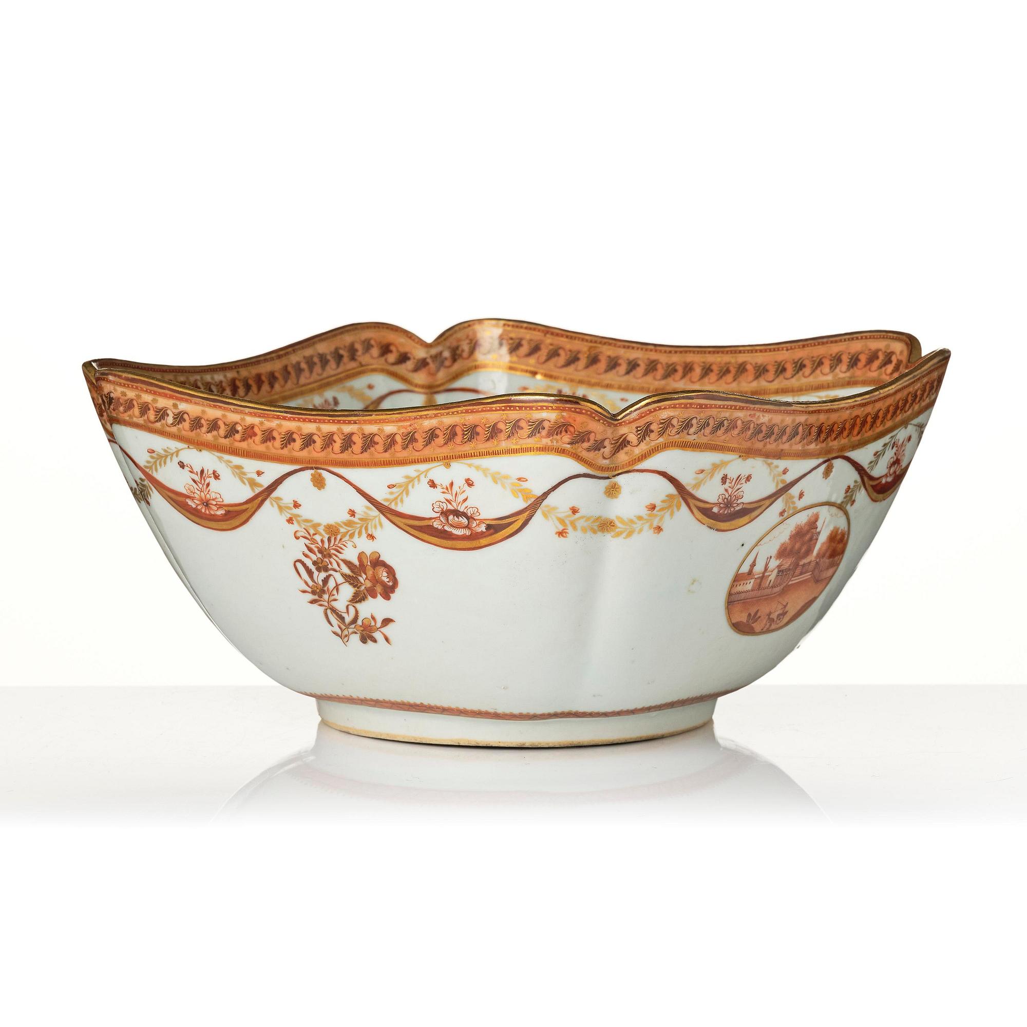 An oval vegetable tureen with cover and a pillow shaped bowl, Qing dynasty, late 18th century.