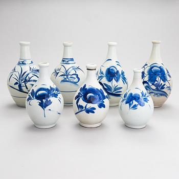 Seven ceramic sake bottles, Japan, the first half of the 20th century.