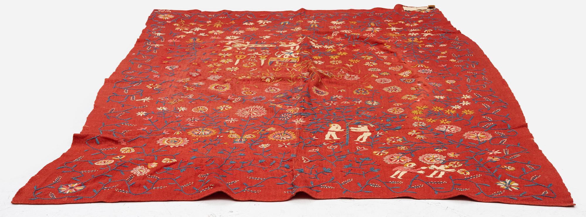 An embroided wool bed cover of 'fall of man' design, South west Scania, Sweden, first half of the 19th century.