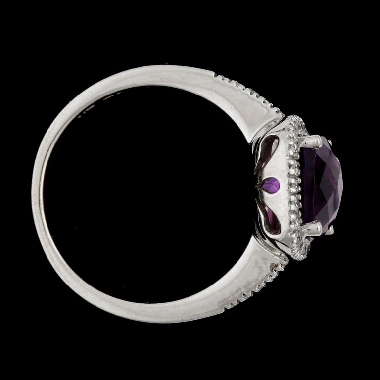 RING, 14k vitguld med ametist ca8x8xmm och briljantslipade diamanter tot ca0,17ct. Vikt 3,9g.