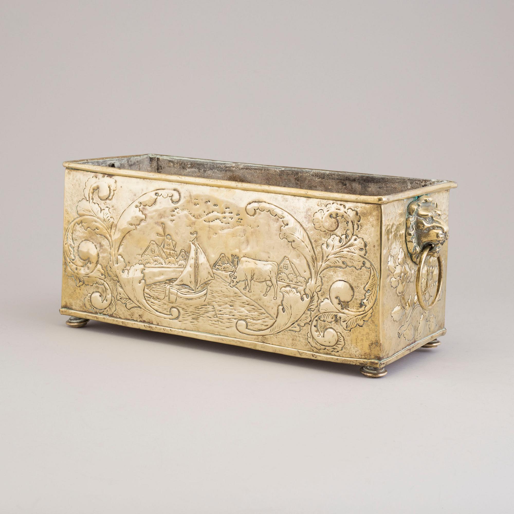 A 18th century brass jardiniere.