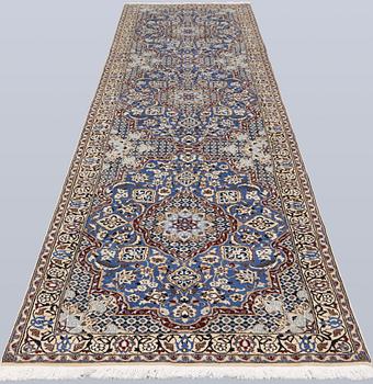 A carpet,  Nain, part silk, so-called 9 LAA, approx. 382 x 99 cm.