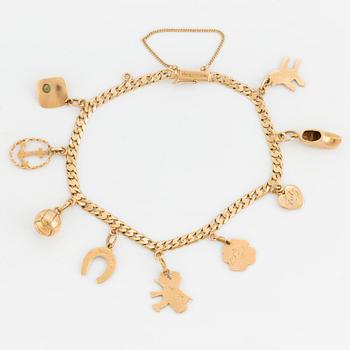 A gold charm-bracelet.