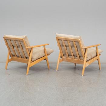 A pair of 'Esbjerg' birch easy chairs, Ikea.