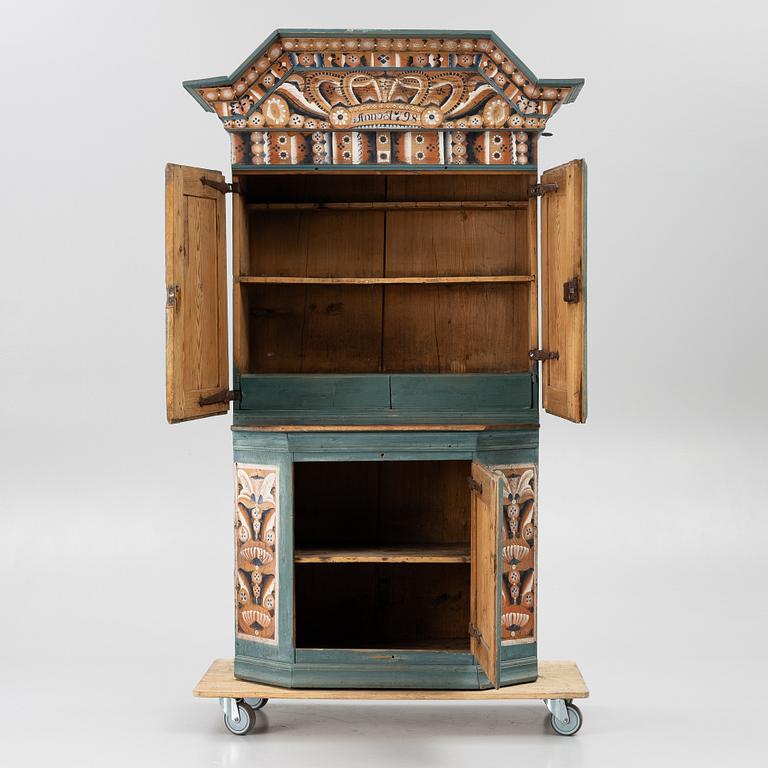 A Dalecarlian polychrome painted cabinet, dated 1798.