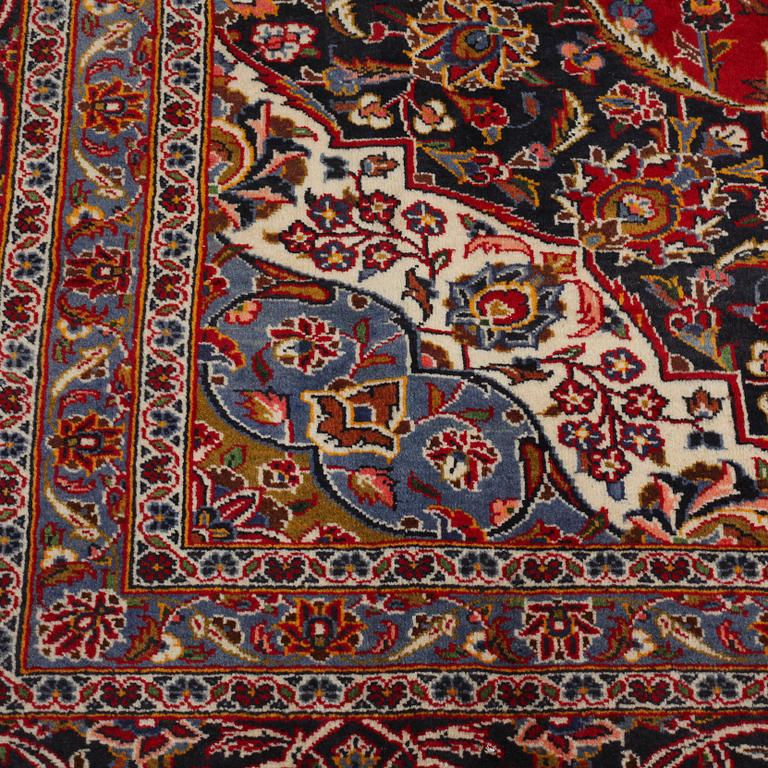 A Keshan rug, 400 x 300 cm.