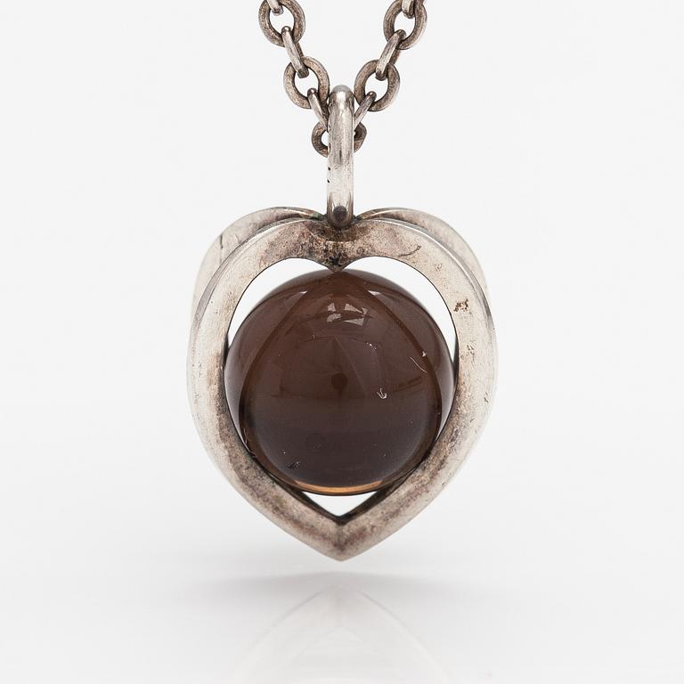 Elis Kauppi, A silver necklace with a smoaky quartz. Kupittaan kulta, Turku.