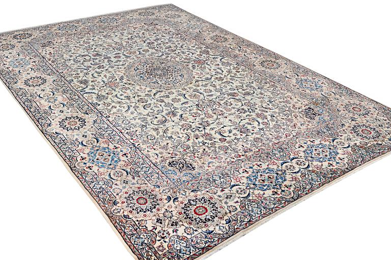 A Nain carpet, part silk, 9 laa, c. 453 x 298 cm.
