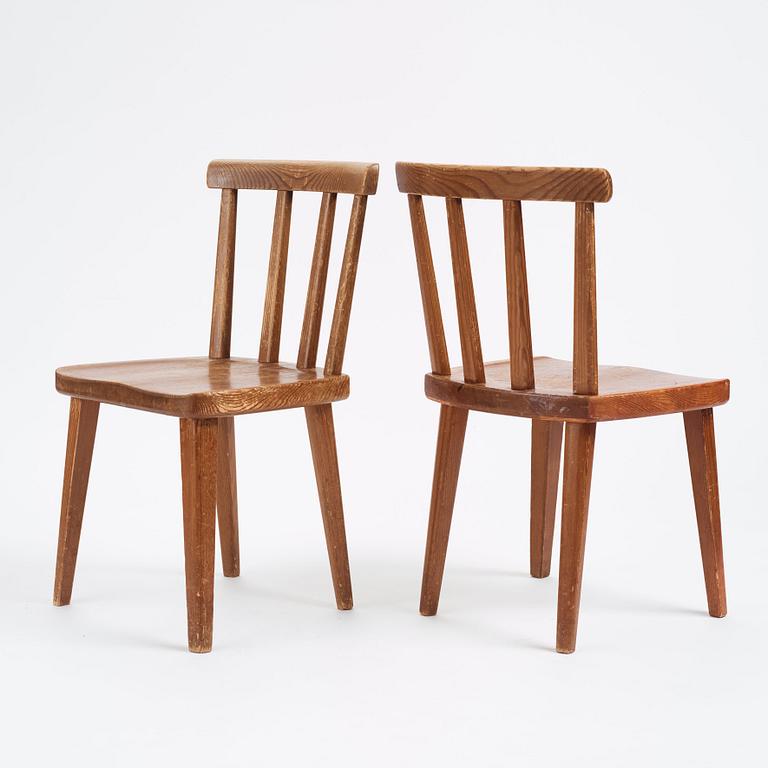 Axel Einar Hjorth, a set of four 'Utö' pine chairs, Nordiska Kompaniet, Sweden 1930s.