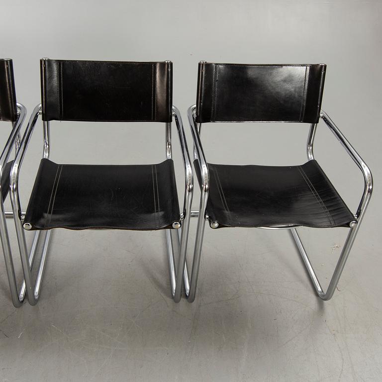 A set of four Italian chrome and leather chairs later part of the 20th century.