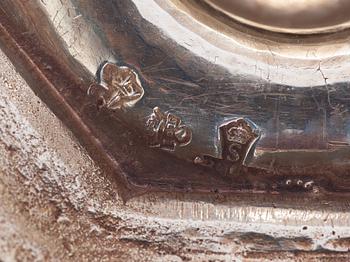 A pair of European 18th century silver candlesticks, unidentified makers mark.