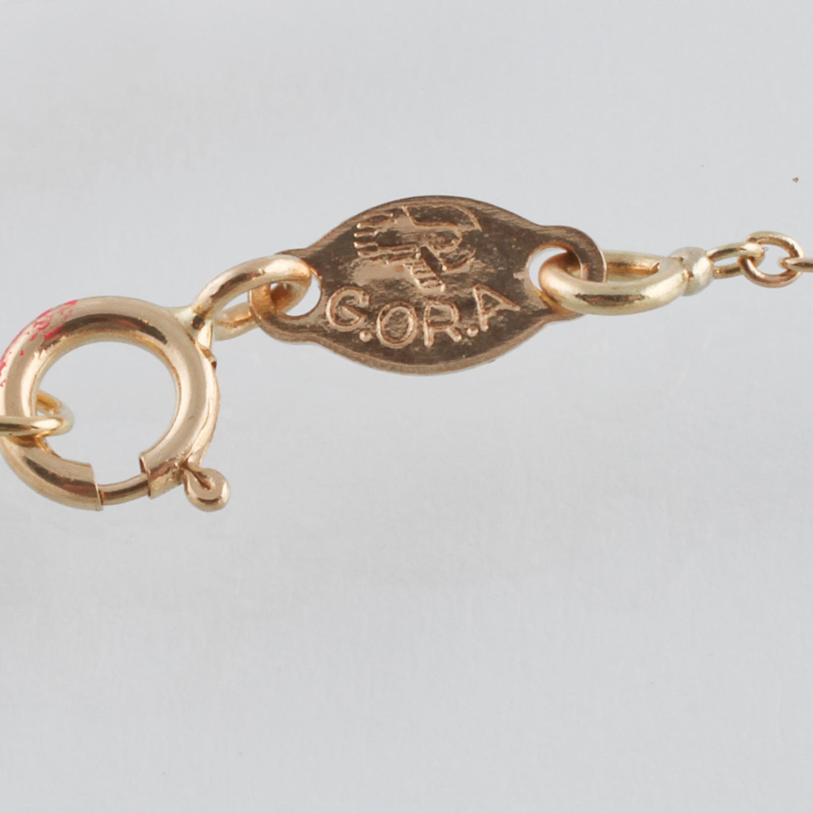 HÄNGE, 18K guld med briljantslipade diamanter och fasettslipade blå safirer ca 0.60 ct. Vikt 4,8 gram.