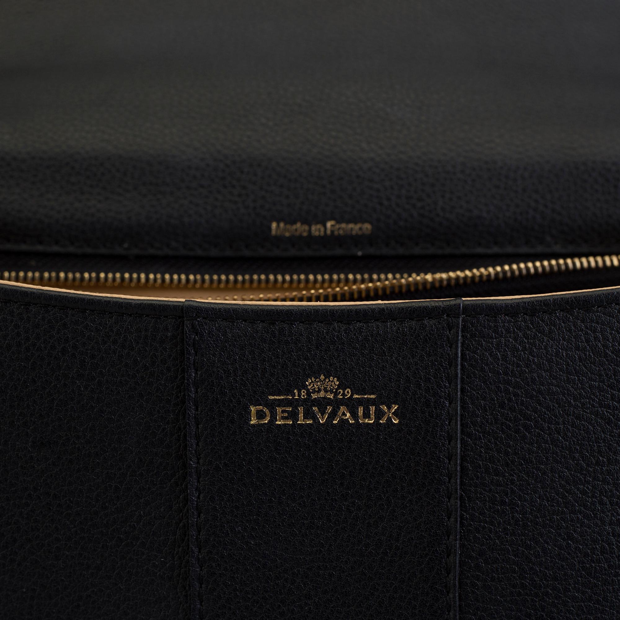 A Delvaux "Brillant" ladies handbag in black colored leather.