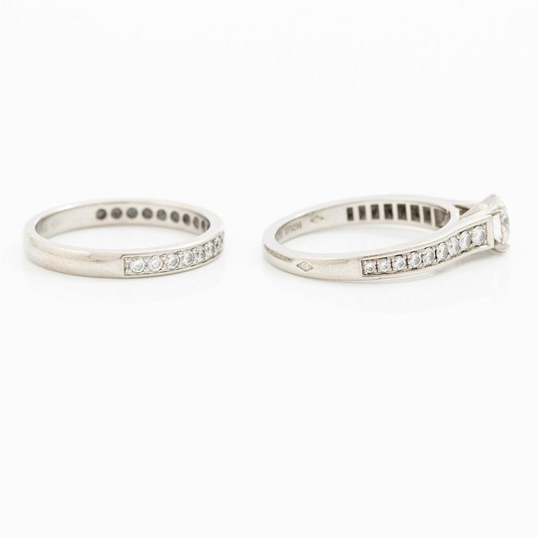 Cartier two rings platinum with round brilliant-cut diamonds.