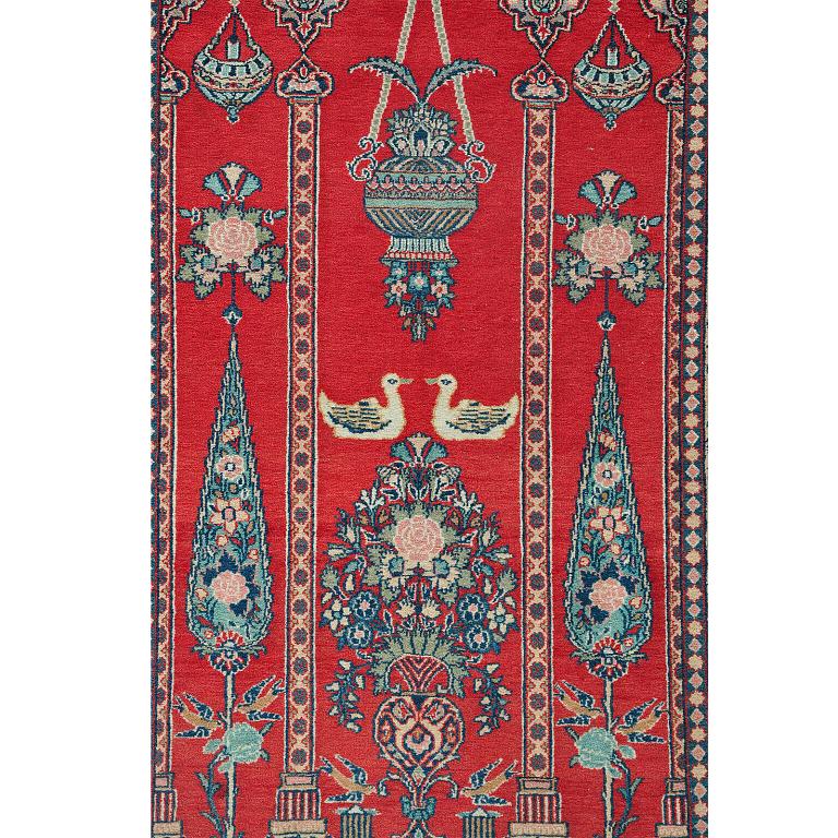 A rug, semi-antique Kashan/Sarouk, ca 210 x 132 cm. figural.