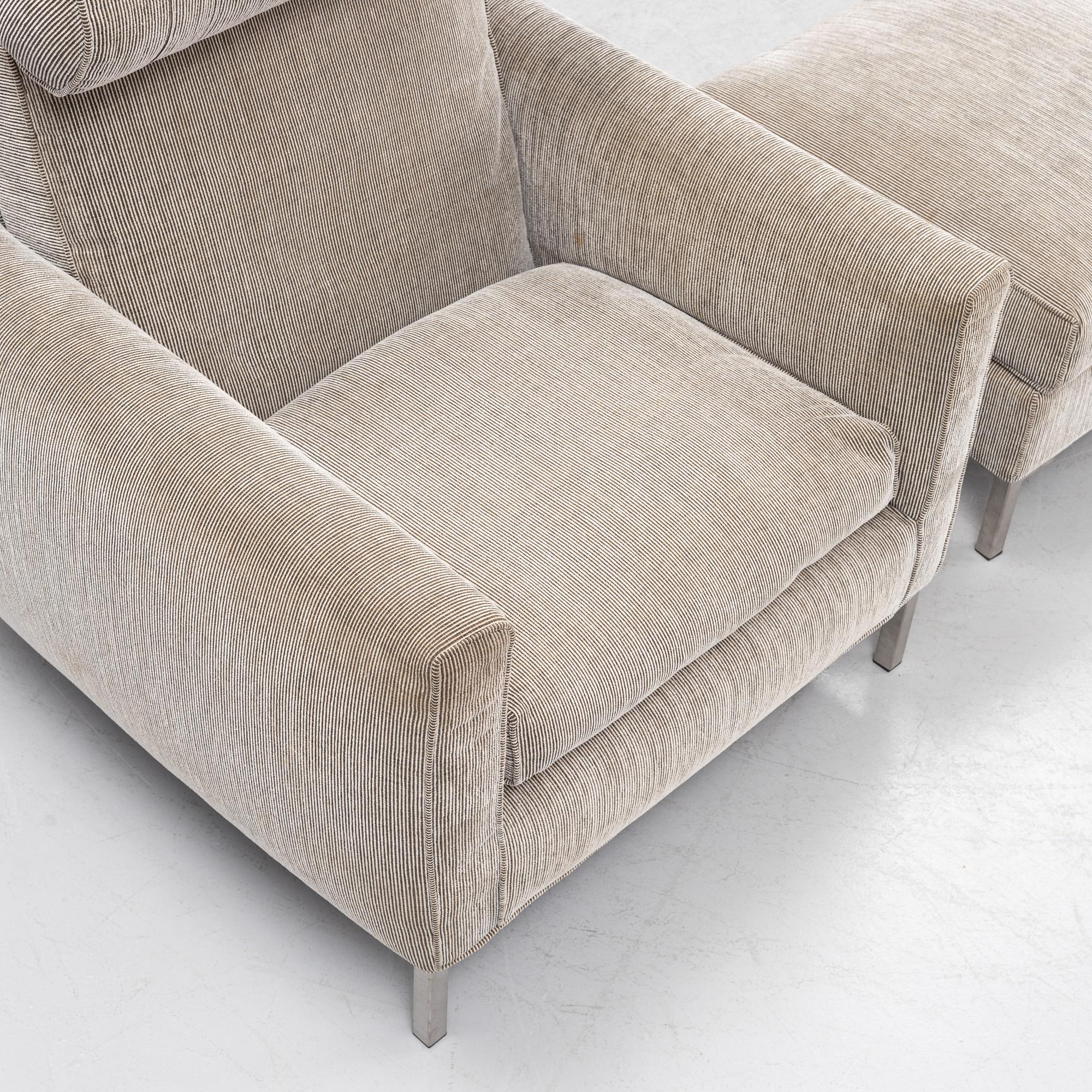 A 'Streamline' armchair with a foot stool, Eilersen.