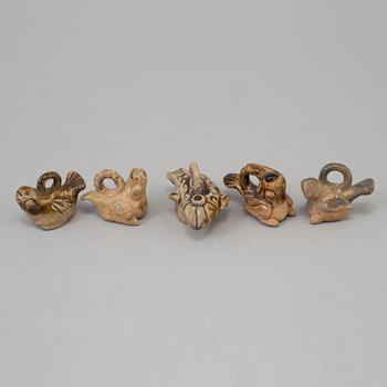 Nine chinese ceramic figures, tang dynasty (618-907).