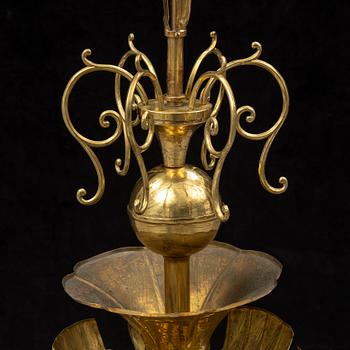 A SIX-LIGHT BRASS CHANDELIER, Swedish Grace, signed Lars Holmström Arvika.