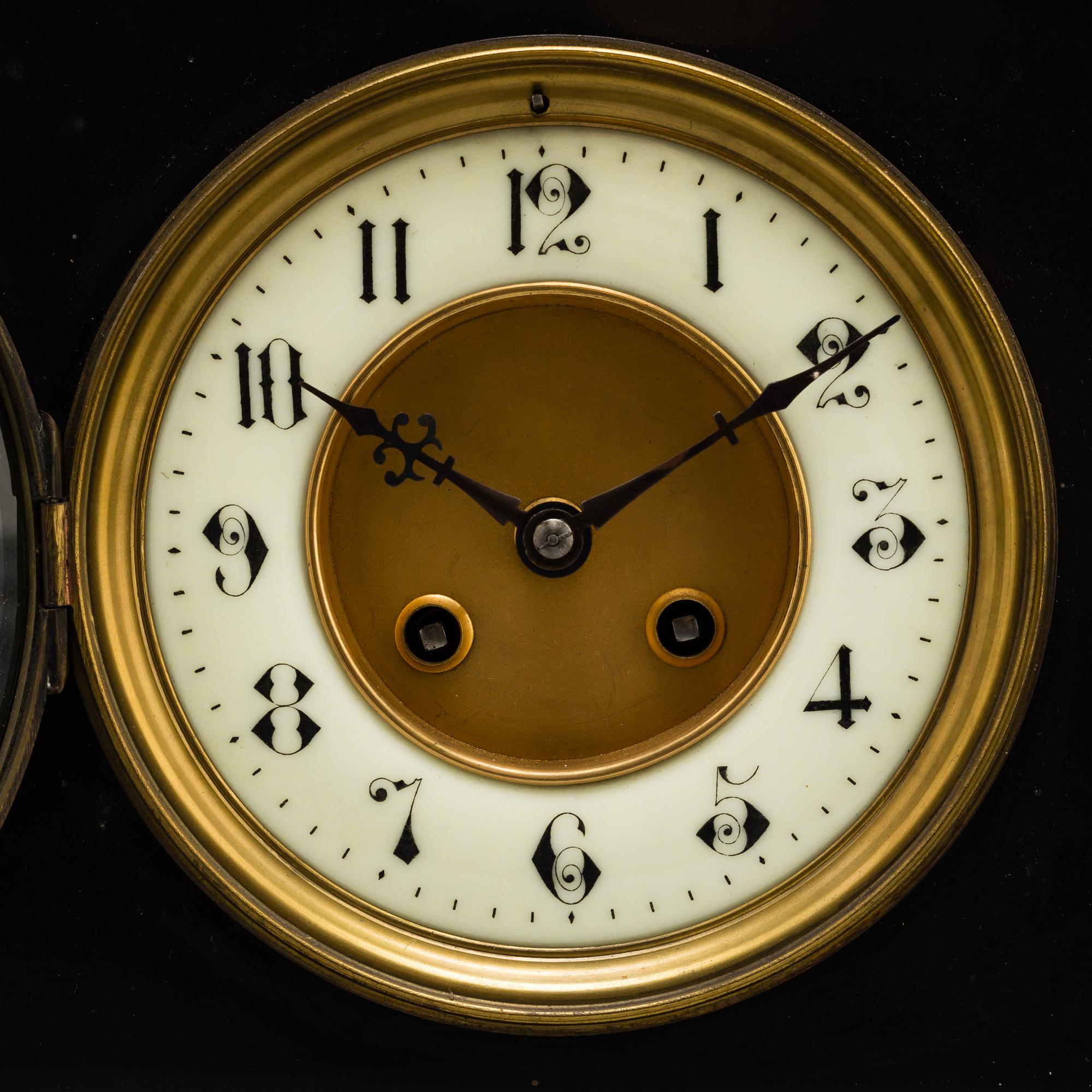 An end of the 19th century stone mantle clock.