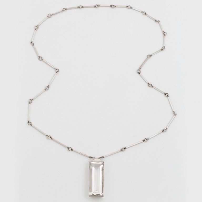 Wiwen Nilsson, a sterling silver necklace with a facet cut rock crystal pendant, Lund, Sweden 1942.