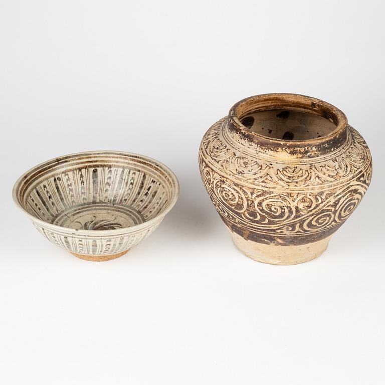 A brown glazed jar and bowl, Sawankhalok, Thailand, 14th/17th Century.