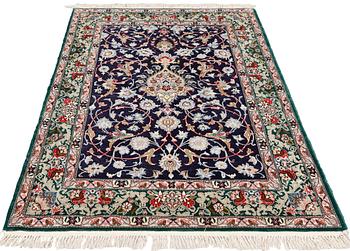 A  silk warp Esfahan rug of Safavid design, c 164 x 107 cm.