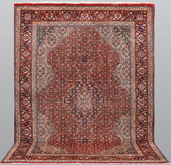 A Sarouk carpet, c 312 x 224 cm.