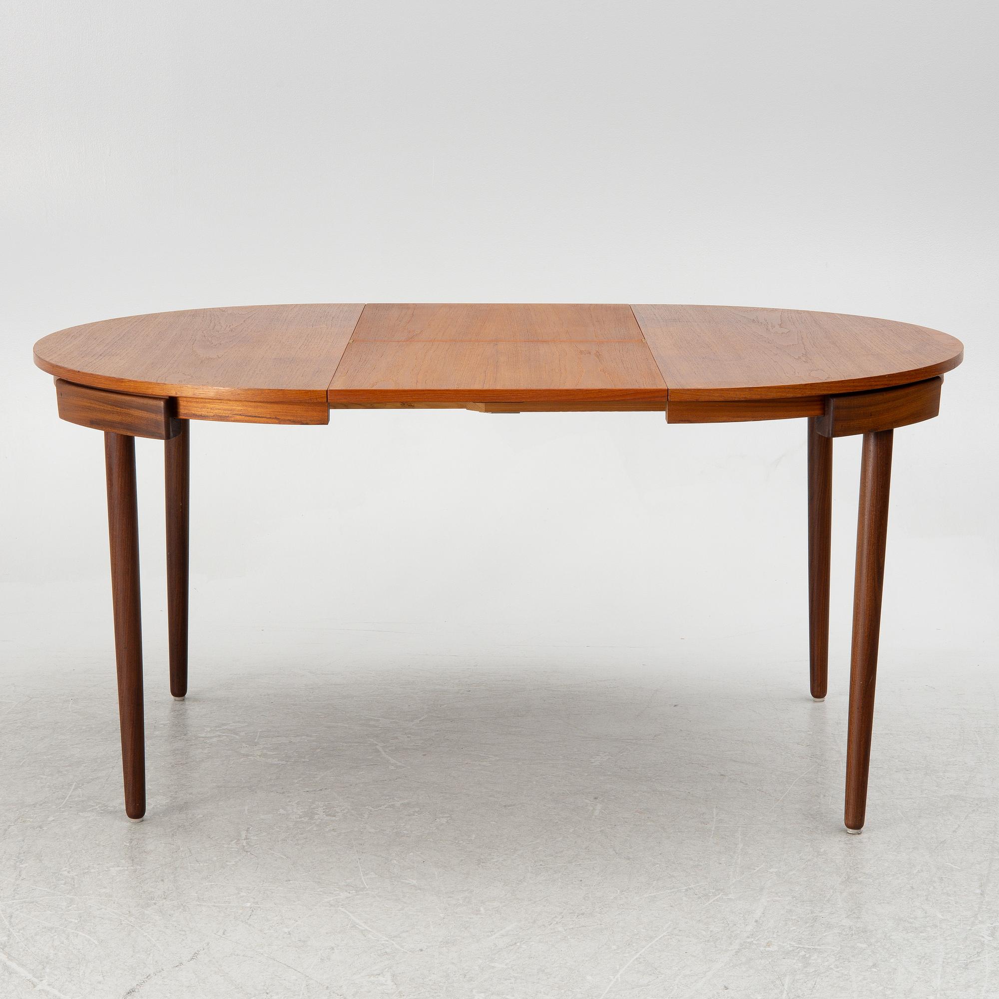 Hans Olsen, a dining table and four chairs, Frem Røjle, Denmark, 1950's.