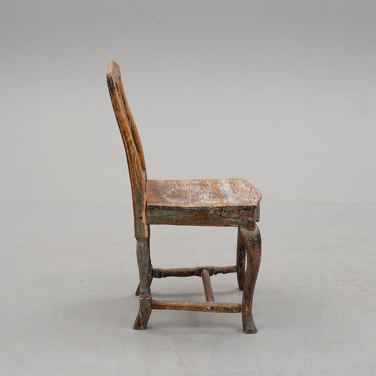 a 18th century wooden chair.