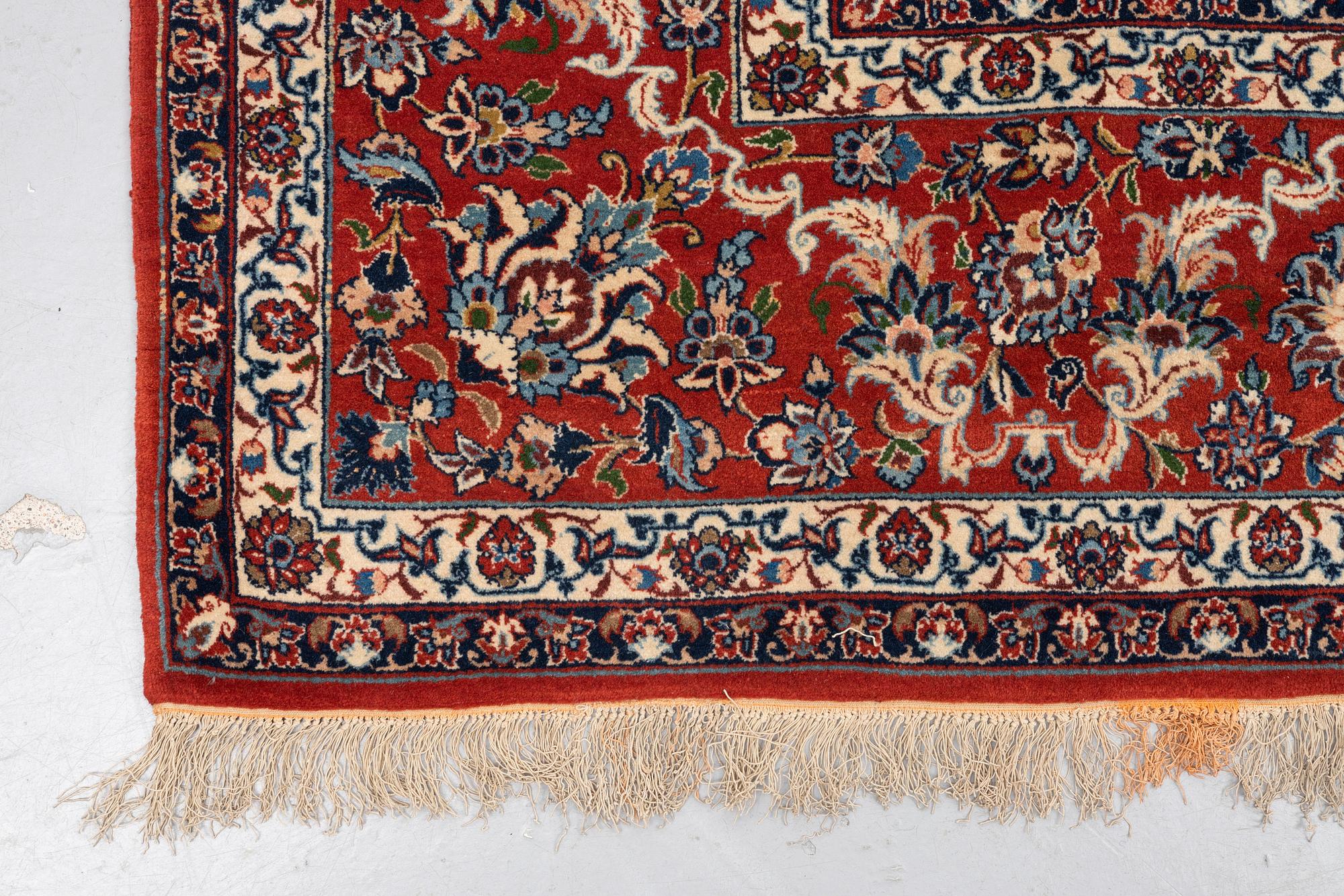 A carpet, semi-antique Esfahan, ca 336 x 212 cm.