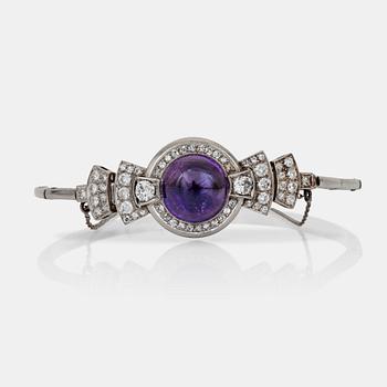 481. A cabochon-cut amethyst and old-cut diamond bracelet.