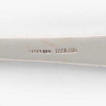 Four sterling silver servers, Thailand 20th century.