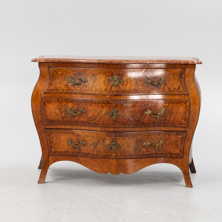 A rococo chest of drawers, mid 18th Century.