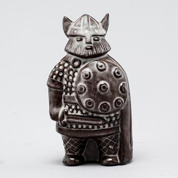 Eight stoneware figurines by Uppsala-Ekeby, from the latter half of the 20th century.