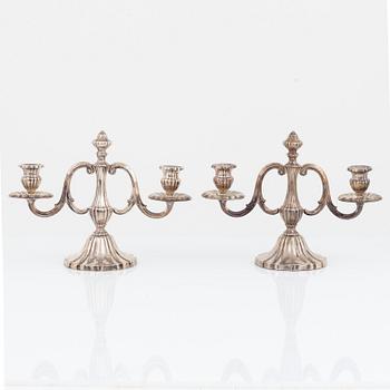 A pair of silver candelabras, swedish import mark.