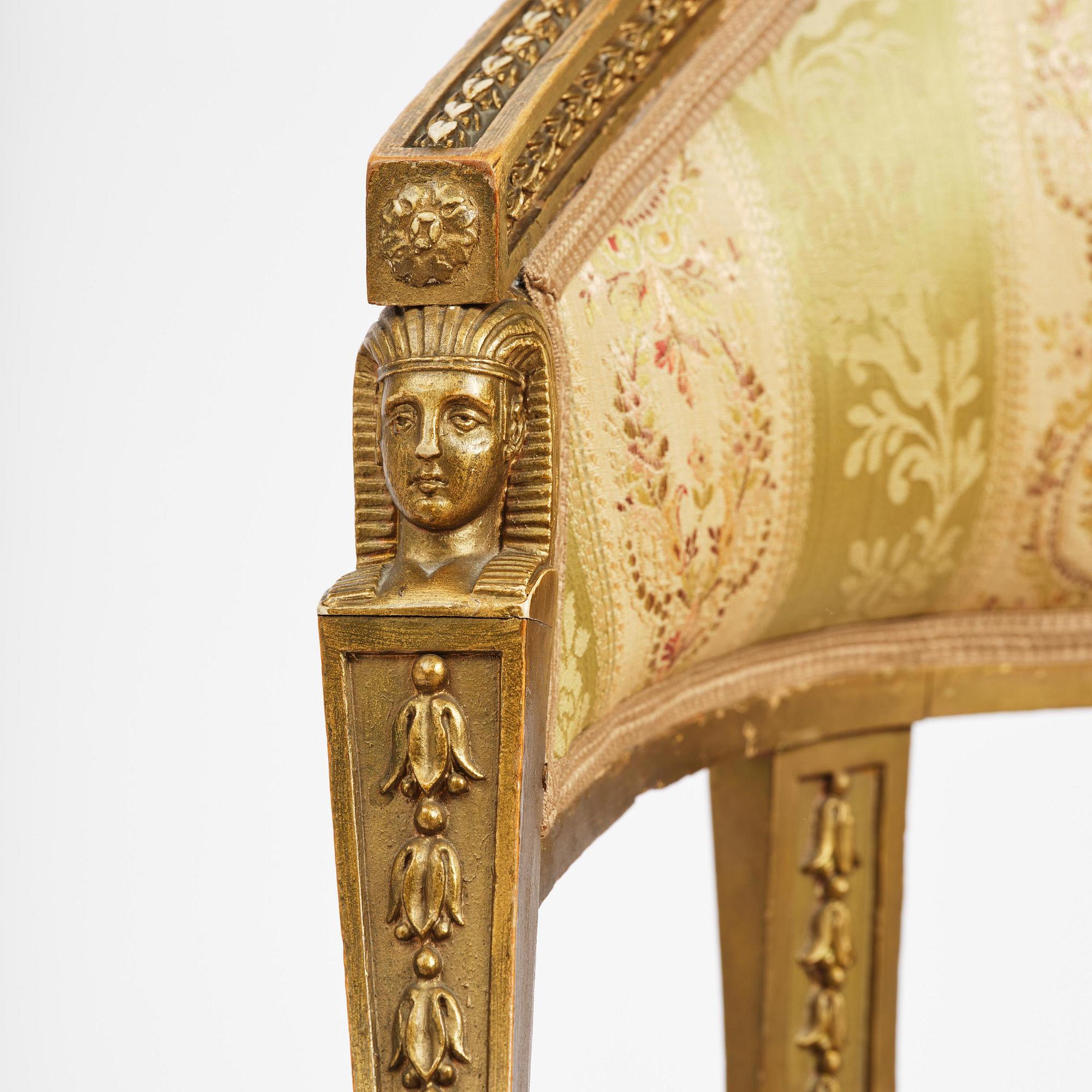 A pair of late Gustavian open armchairs attributed to E. Ståhl (master in Stockholm 1794-1820).