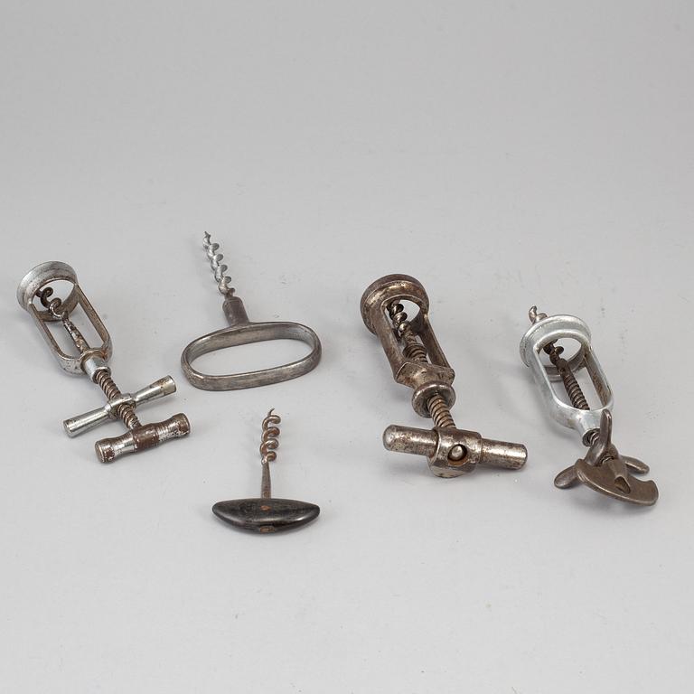 Five steel cork screws, early 20th century.