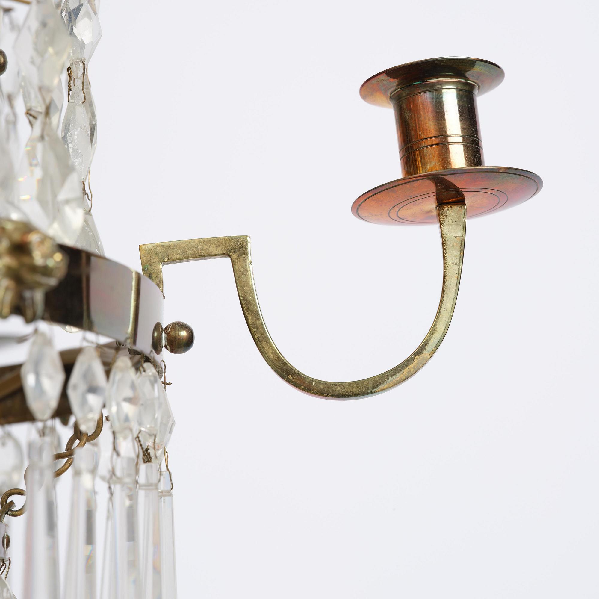 A late Gustavian gilt brass and cut glass seven-light chandelier, circa 1800.