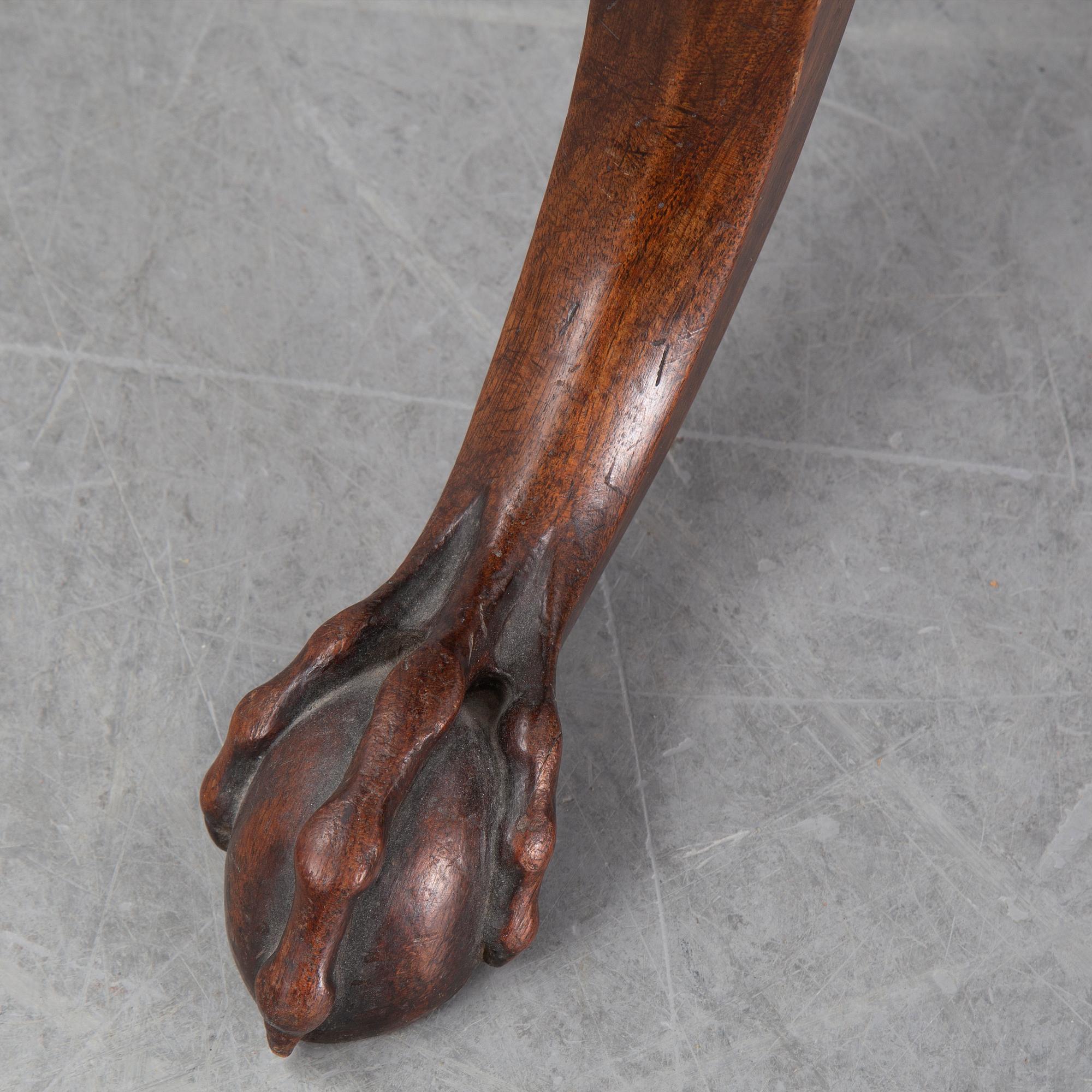 A mahogany folding table, England circa 1800.