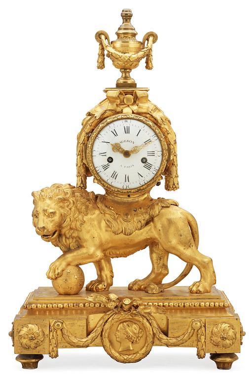 A French Louis XVI 1770's gilt bronze Lion mantel clock signed "Ageron a Paris nr 428".
