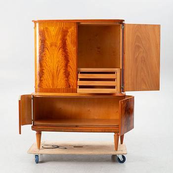 A Swedish Modern cabinet, mid 20th Century.