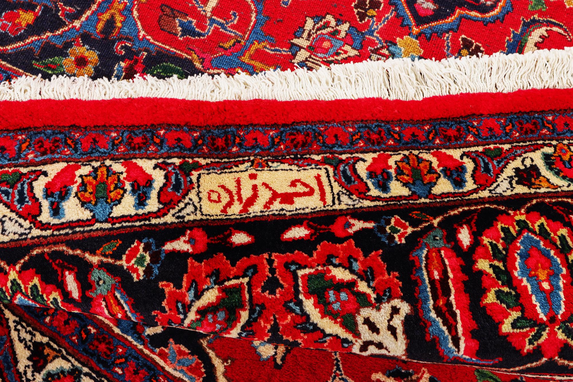 A Najafabad carpet, c. 351 X 305 cm.