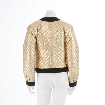 YVES SAINT LAURENT, a gold colored leather jacket.Size 34.