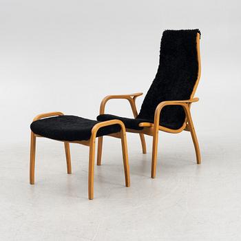 Yngve Ekström, armchair with footstool, "Lamino", Swedese, 21st century.