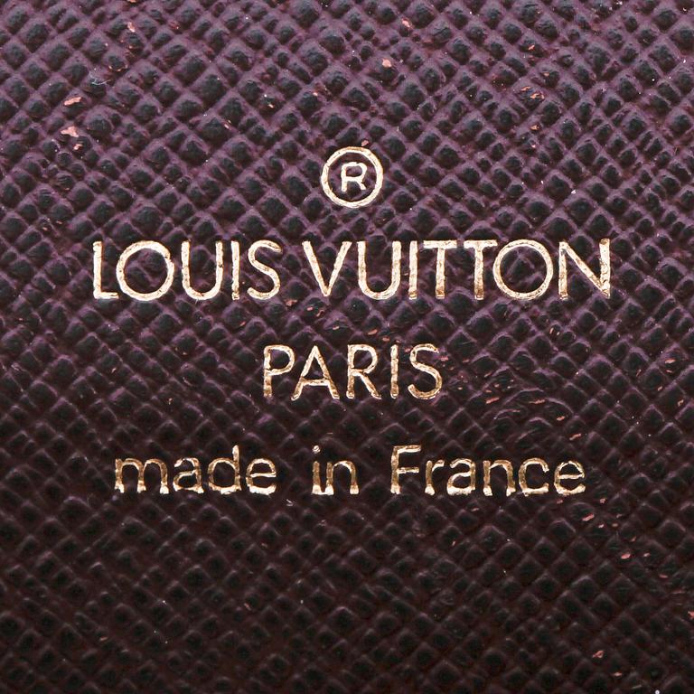 LOUIS VUITTON,  a brown taiga leather birefcase, "Angara".