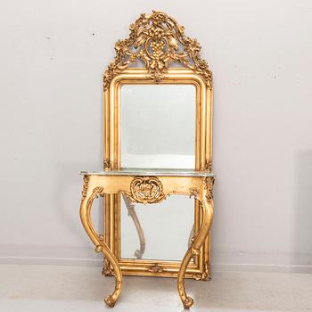 A bronzed Neo Rovovo mirror and table later part of the 19th century.
